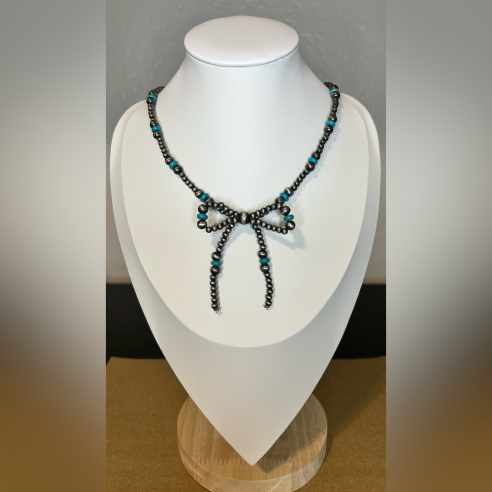 Woman’s Turquoise Bow Necklace